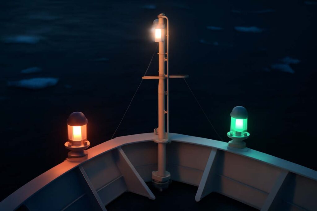 Close-up of marine navigation lights glowing on cruise ship at night in Arctic waters